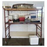 Rolling Baker Bros. metal scaffolding and