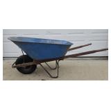 Metal wheelbarrow, blue and rope