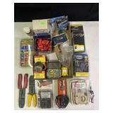 Group of multimeters, electrical testers, wiring