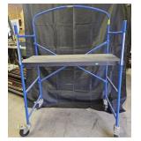 Small, blue scaffolding. 37'L, 18.5'W, 53.5'H