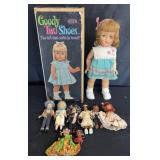 Group of dolls: Goody Two Shoes in original box,