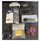 Group of electronics and various cords/adaptors,