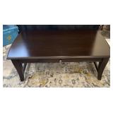 Wooden coffee table with center drawer, 48' x 26'