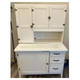 Hoosier cabinet with enameled metal top, sifter,
