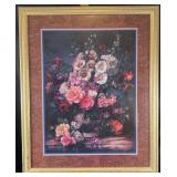 Framed print depicting floral still life, as