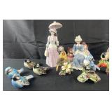 Group of porcelain figures and birds, 4 Goebel,