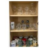 Contents of 2 kitchen cabinets: pitchers,