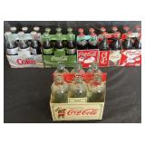 Collection of full & empty Coca-Cola bottles, 24