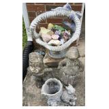 Group of lawn decorations, concrete basket and