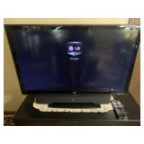 47ï¿½ LG TV with remote & Polk Audio soundbar, TV