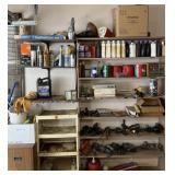 Contents of garage wall: sander, grinder, jigsaw,