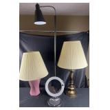 2 table lamps, floor lamp and bathroom lighted