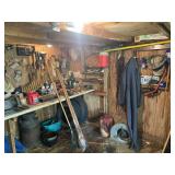 Contents of shed, lumber, yard tools, bench