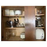 Contents of 2 garage cabinets: kitchenware, rice
