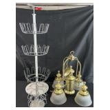 Brass chandelier with frosted shades, display