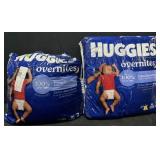 2- 66ct. Pouches of Huggies Overnites Size 3