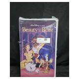 Beauty and the Beast throw blanket in VHS shaped