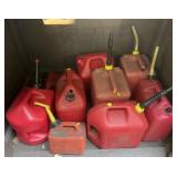 9 empty gas cans, various sizes