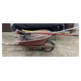 Wheelbarrow and brooms