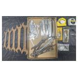 Group of wrenches and measuring tapes