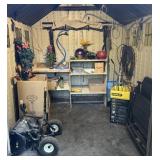 Contents of shed #3, spreader, lawn chair, yard