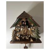 Black Forest chalet cuckoo clock featuring