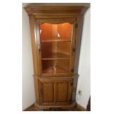 Tell City lighted corner cabinet with lower