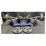 Group of free weights & curl bars