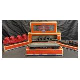 4 Lionel train cars & No. 6019 remote control