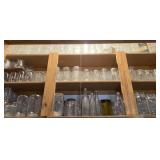 Collection of canning jars, top 2 shelves of hall