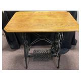 Vintage sewing machine table with cast iron