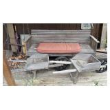 Wooden porch swing and 2 decorative wheel barrows