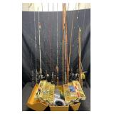Group of fishing poles and full tackle box