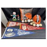 Group of sports collectibles, vintage pennants,
