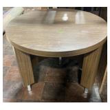 Vintage round table with semi-circle base and