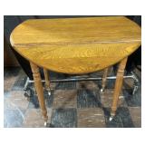 Antique oak drop leaf table with drawer &