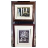 2 framed prints depicting floral still life &