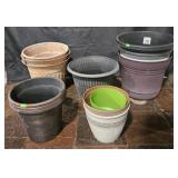 Planters all different sizes. Approximately 14