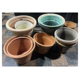 Collection of clay & plastic flower pots