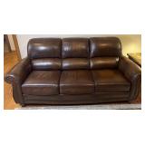 3 cushion leather couch with nailhead trim, 84ï¿½ x