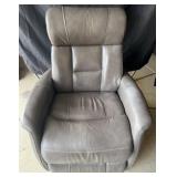 Gray faux leather powered recliner on swivel