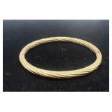 14K gold bangle, marked 'J 14k', 4.49 dwt