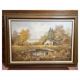 Framed oil on canvas depicting barn in summer