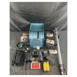 Group of vintage cameras, binoculars, reel to