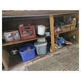 Contents of lower shelves under woek bench.
