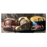 3 bowling balls with cases