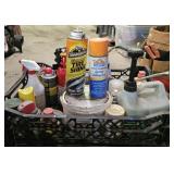Partial cans of various auto and garage cleaning,