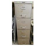 Metal 4 drawer file cabinet w/ contents included