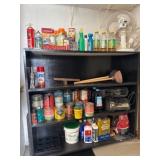 Black Storage Shelf With Miscellaneous Items
