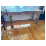 Carved Wooden Bench With Elephant Head Motifs